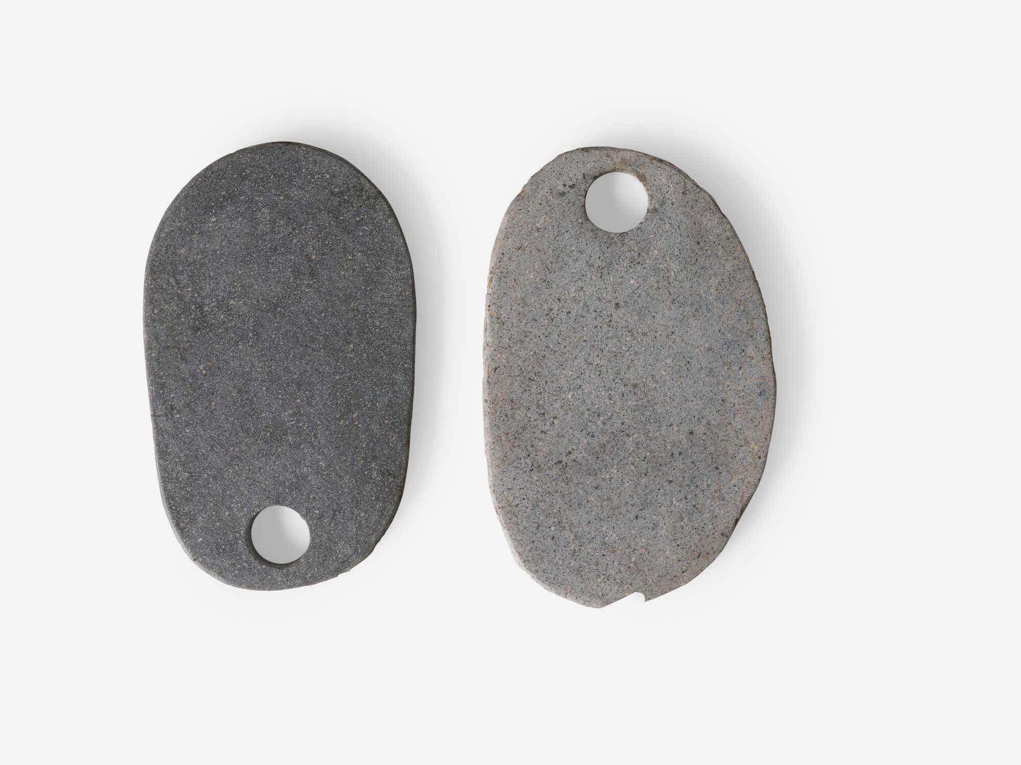 Two small natural stone platters top view